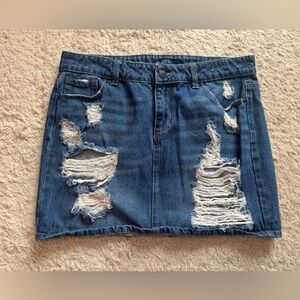 Blue spice distressed skirt